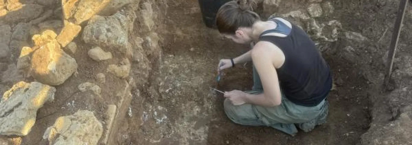 Nicole Spangler during an archaeological dig.