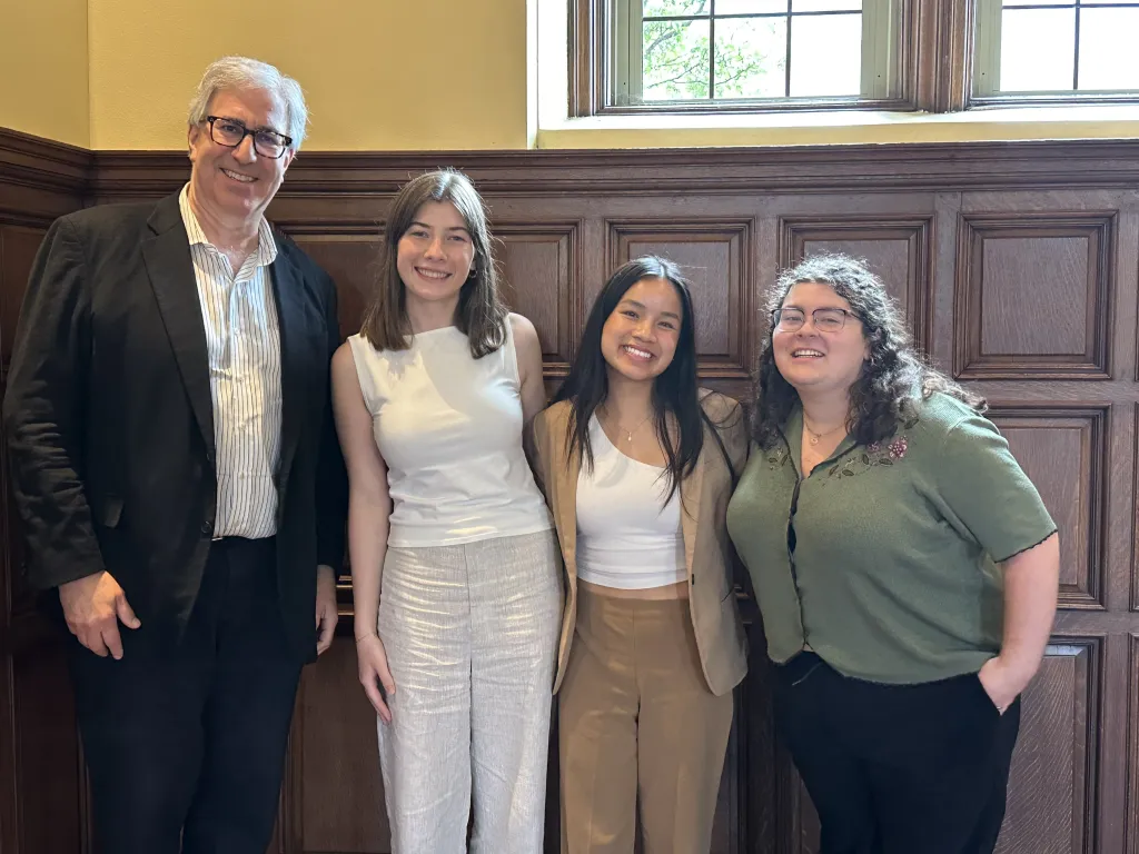 Professor Iver Bernstein stands at the far left next to the 2025 Living History Scholars Nicole Spangler, Vy Nguyen, and MJ Jones