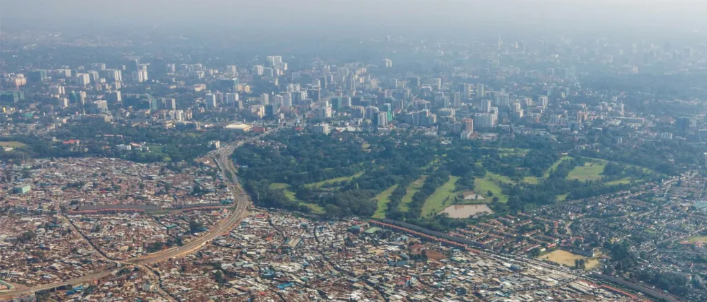 "beauti"The contradictions of Nairobi: there is a “slum” right next to a golf course, both of which overlook a “modern” city."