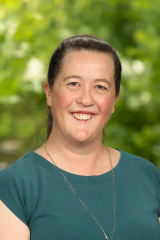 Image of Tanya Roth, PhD - she smiles at the viewer