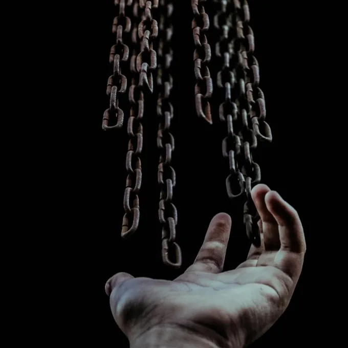 "Credit to Venezuela by Zulmaury Saavedra, image of hand and chains "