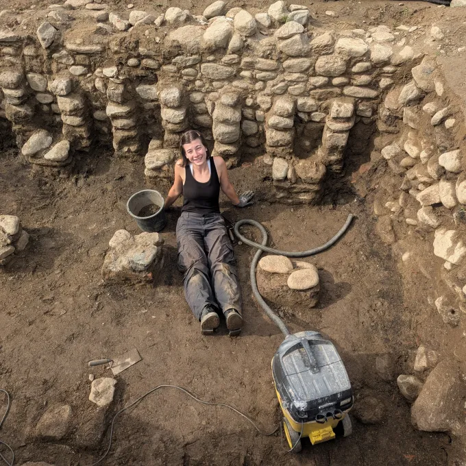 "Spangler at an ancient Roman archaeological site in East Tirol, Austria (Aguntum Archaeological site), digging to uncover the architecture and building phases of the city."